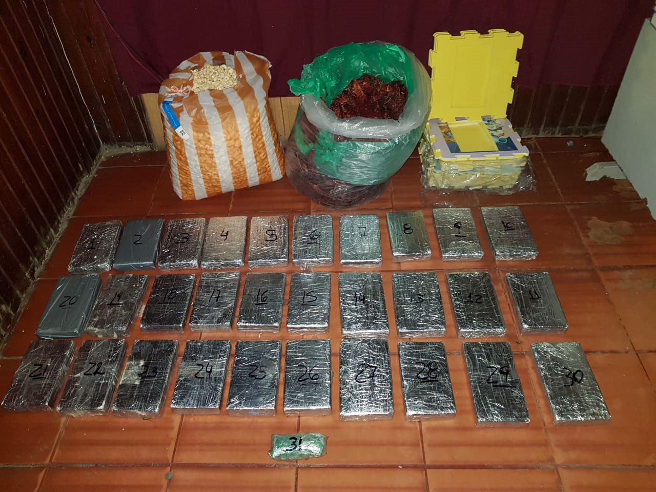 32 kilos 52 gramos de cocaína